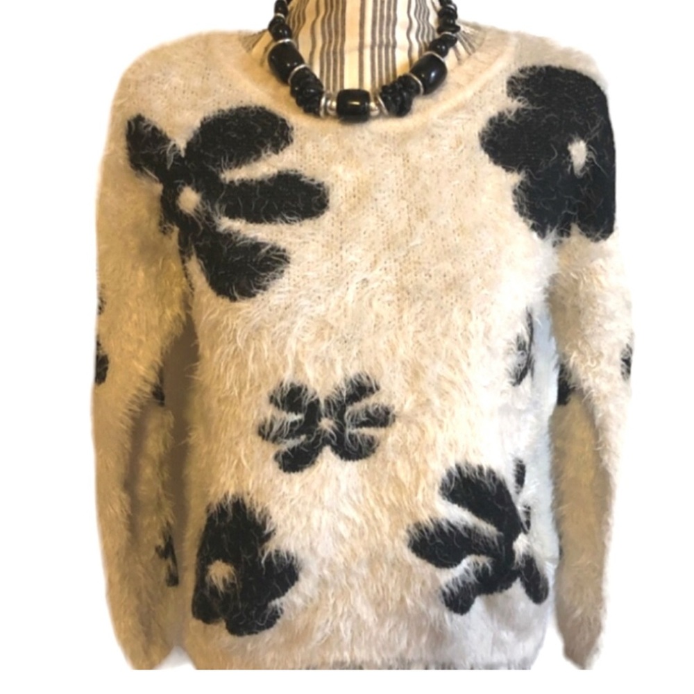 Woman’s Anthropologie sweater size medium